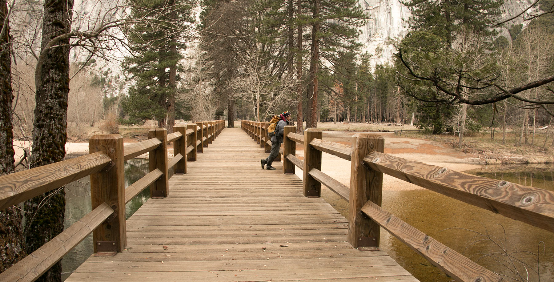 Man standing on Swinging Bridge